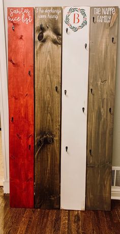 three wooden boards with different designs on them