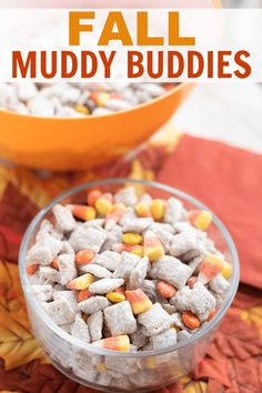 an autumn chex mix in a glass bowl with candy corn on top and the title above it