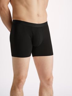 Our Alex trunks are cut for a streamlined, classic look with a fitted shape, classic open front and a longer leg. A fabric-covered waistband provides gentle skin contact. Crafted from a lighter weight version of our best-selling Basel fabric, combining a blend of 94% micro modal and 6% elastane for exceptional softness and comfort. Not only is the Alex soft, but thermostatic properties in the micro modal fibres allow them to react to changes in temperature and regulate your body heat. What's mor Holiday Capsule Wardrobe, Cotton Dressing Gown, Silk Dressing Gown, Mens Trunks, Stylish Men Casual, Casual Vest, Cotton Polo Shirt, Body Heat, T Shirt Vest