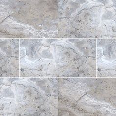 four different pictures of marble tiles in grey and white colors, each with an interesting pattern