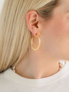 A hoop is quintessential to every southern jewelry box, but not all hoops are created equal. The brushed detail on our Textured Classic Hoops has a modern flair without stealing the spotlight from your outfit. Shiny and lightweight, these gold earrings will complement your wardrobe in every season. Textured Small Hoop Yellow Gold Earrings, Elegant 14k Gold-filled Tarnish-resistant Hoop Earrings, Elegant Textured Gold Plated Hoop Earrings, Chic Gold-tone Tarnish Resistant Hoop Earrings, Southern Jewelry, Susan Shaw, Luxury Tarnish-resistant Brass Hoop Earrings, 24kt Gold, Gold Texture