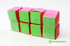 a group of cubes sitting next to each other on top of a white surface