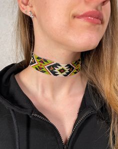 Unisex choker with native American designs . Made from Czech beads. Length 12.2 inches (31 cm)+Chain extension 2 inches (5cm) Width 1,1 inches (3 cm)  >Back to my shop: https://www.etsy.com/shop/jewelrybylarisa?ref=seller-platform-mcnav Adjustable Multicolor Choker Jewelry, Unique Adjustable Multicolor Choker, Unique Multicolor Adjustable Choker, Southwestern Adjustable Choker Jewelry, Adjustable Southwestern Style Choker Jewelry, Adjustable Yellow Choker Jewelry, Southwestern Style Adjustable Choker Jewelry, Traditional Adjustable Choker With Tiny Beads, Southwestern Style Choker Jewelry Gift