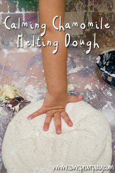 a person standing on top of a dough ball with their hand over it and the words, calming chamole melting dough