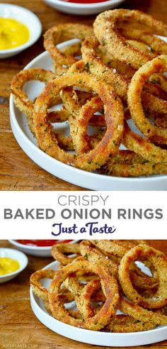 crispy baked onion rings on a plate with mustard and ketchup in the background