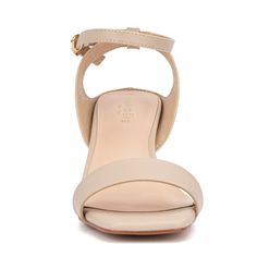 Be admired by some and envied by most when you wear the stunning Candida sandal. Featuring a wide strap and a block heel that almost resembles a wedge, these sandals are both unique and stylish. The hint of gold embellishment adds a touch of elegance, ensuring you stand out in any crowd. Perfect for elevating any outfit, the Candida sandal combines comfort and sophistication, making it a must-have addition to your shoe collection. Modern Open Toe Sandals With 4-inch Heel, Open Toe Block Heels With 4-inch Heel, Summer Wedge Heel Block Heels With Heel Strap, Modern Open Toe Block Heels, Modern Wedge Sandals With Padded Block Heel, Beige Sandals Medium Width Low Heel, Beige High Heel Wedge Sandals With Padded Heel, Modern Wedge Sandals With Heel Loop, Beige Sandals With Medium Width And Low Heel