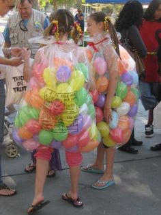 two girls in plastic bags with balloons on their back and the caption reads, use a black permanent marker to write the nutrition information