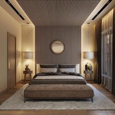 a bedroom with a large bed and wooden floors