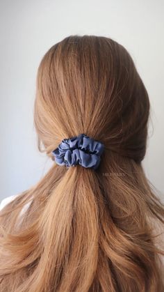 Elevate your hairstyle game with this low half ponytail featuring a delicate XXS scrunchie, perfect for holding just a section of your hair while leaving the rest down. This subtle yet stylish look adds a touch of charm and elegance to any outfit. Ideal for those who love minimalistic and effortless styles, this hairstyle is perfect for casual days or a polished work look. Discover how this tiny accessory can make a big impact on your overall style! Pin now for instant inspiration! #XXSScrunchie #HalfPonytail #MinimalistStyle #HairInspo #EffortlessBeauty Half Ponytail, Hair Idea, Effortless Beauty, Your Hairstyle, Trendy Hair, Hair Game, Work Looks, Handmade Business, Effortless Chic