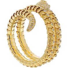 Crafted with utmost artistry and passion, the 18K Yellow Gold Serpent Snake Wrap Around Diamond Bracelet is an exquisite piece that captures the essence of elegance and allure. This bracelet is a testament to the beauty and craftsmanship of fine jewelry, designed to enchant and mesmerize.The serpent motif of this bracelet adds a touch of mystique and symbolism to its design. The 18K yellow gold serpent gracefully wraps around your wrist, creating a striking and captivating look. Its intricate de Luxury Flexible Gold Bracelet For Formal Occasions, Luxury Yellow Gold Cuff Bracelet, Luxury Yellow Gold Bracelet, Luxury Flexible Yellow Gold Diamond Bracelet, Luxury Hand-set Jewelry, Luxury Gold Bangle Bracelet, Luxury Flexible Gold Diamond Bracelet, Luxury Gold Jubilee Bracelet, Luxury Flexible Gold Bracelet