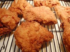 some fried food is cooling on a rack in the oven and ready to be eaten