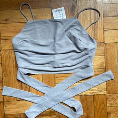 New With Tags Grey Crop Wrap Top. Perfect For Spring. Zara Stretch Cotton Crop Top, Fitted Cotton Crop Top With Tie Back, Fitted Cotton Tops With Tie Back, Fitted Cotton Tie Back Top, Fitted Cotton Tie-back Top, Zara Fitted Cotton Crop Top, Fitted Cotton Crop Top By Zara, Zara Gray Summer Top, Summer Gray Cotton Crop Top