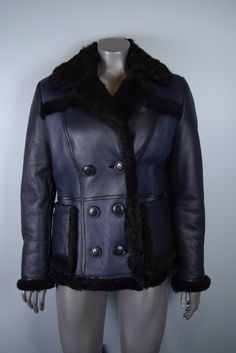 ITEM: Womens Burberry Brit Shearwell Double Breasted Shearling Jacket **Body of this jacket is more on the snug side and arms are slightly longer. Best fits size 6-8 Lush, curly shearling fur lines the interior and details the ruggedly grained exterior of a double-breasted leather jacket with sophisticated color-blocked appeal. Sleek piping at the seams and a button half-belt accentuate the beautiful fit and underscore the meticulous attention to detail. Front button closure. Notched collar. Lon Luxury Shearling Leather Jacket For Work, Designer Sheepskin Fur Coat, Classic Leather Fur Coat, Designer Sheepskin Outerwear For Work, Leather Coat Jacket, Burberry Brit, Check Pattern, Shearling Jacket, Leather Coat