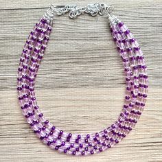 💞One of a kind & ready to ship💞  Acrylic (lightweight) beads in stunning shades of light and dark purple 😍 5 strand chunky necklace makes a great statement piece!  16 inch necklace with a 4 inch extender chain.  Thank you for supporting American small business :) Like this style but prefer another color? Check out our other BIG BEAD necklaces:  https://www.etsy.com/shop/PolkaDotDrawer?ref=hdr_shop_menu&search_query=big+bead Purple Beaded Necklaces With Large Round Beads, Purple Handmade Double Strand Necklace, Purple Multi-strand Beaded Necklace, Lavender Beaded Necklaces For Jewelry Making, Lavender Necklaces With Colorful Round Beads, Handmade Lavender Crystal Bead Necklaces, Lavender Beads For Jewelry Making, Handmade Purple Multi-strand Beads, Handmade Lavender Beaded Necklaces With Round Beads