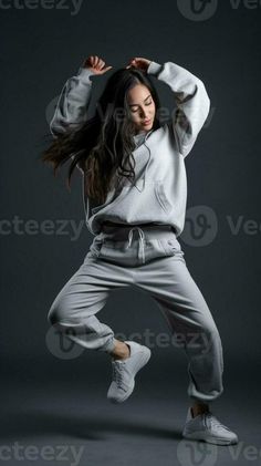 She loves dancing Full lenght of attractive young woman in smart casual wear dancing against grey background and looking happy, Generative AI Smart Casual Wear, Grey Background, Gray Background, Young Woman, Smart Casual, Dance Wear, Love Her