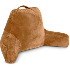 a large brown pillow sitting on top of a white surface