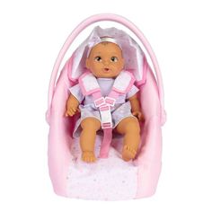 a baby doll is sitting in a pink stroller