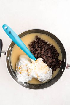 chocolate chips and marshmallows in a saucepan