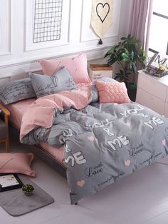 a bed room with a neatly made bed and pillows