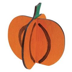 a wooden cutout of a pumpkin on a white background