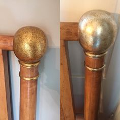 two wooden posts with metal balls on them in the corner of a room next to a wall