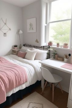 a bedroom with a bed, desk and chair next to a window in the corner