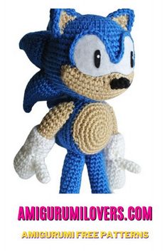 a crocheted blue and white stuffed animal