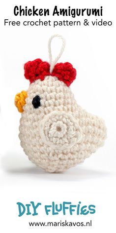 a crocheted chicken ornament with a red bow on it's head