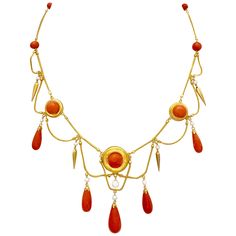 Very elegant and delicate necklace made out of 18 karat gold around 1870 in the neo archeological style. Fine fox tail chains alternate with coral beads and round gold disks reminiscent of targets. The disks, the larger one as centrepiece of the necklace and two smaler ones to either side are decorated with large coral boutons. More fox tail chains are suspended like garlands from the top row of gold chains. Every point of connection is accentuated by an articulated orient pearl with either a go Antique Yellow Gold Necklace With Cabochon, Antique Yellow Gold Necklace With Historical Design, Traditional Cabochon Necklace For Formal Occasions, Traditional Formal Cabochon Necklace, Elegant Yellow Gold Necklace With Historical Design, Yellow Gold Cabochon Necklace For Wedding, Traditional Gold Cabochon Necklaces, Elegant Gold Necklace With Historical Design, Gold Art Nouveau Necklace For Formal Occasions