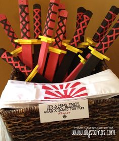 a basket filled with lots of different colored knives