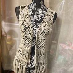 Size Medium Nwot Off White/Beige Crochet Vest With Fringe Bohemian Open Knit Beach Vest, Fitted Beige Bohemian Vest, Bohemian Fitted Beige Vest, Fitted Bohemian Beige Vest, Beige One-size Crochet Top, One Size Beige Crochet Top, Crochet Fringe Vest, Crocheted Vest, Beige Crochet