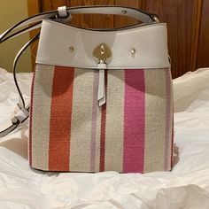 Brand New With Tags Kate Spade Marti Striped Canvas Small Bucket Bag In Color Multi. Leather Top, Drawstring And Adjustable Strap. Can Be Used As A Cross Body Or Arm Bag. Three Interior Compartments. Kate Spade White Shoulder Bag With Leather Handles, White Kate Spade Bag With Adjustable Strap, Kate Spade Designer White Shoulder Bag, Designer Kate Spade White Bag, White Designer Kate Spade Shoulder Bag, Designer White Kate Spade Bag, Kate Spade White Shoulder Bag, Small Bucket Bag, Kate Spade Purse Black