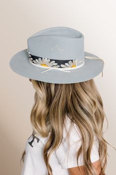 Western 50x in Powder Blue Teardrop crown with flat 3" brim Daisy Flower hand loomed beaded band Elk leather accent band in White Hand stitched Mountain detail This felt hat is made to order, please allow 6-8 weeks for delivery. Spring Adjustable Hat With Flat Crown, Bohemian Flat Brim Fitted Hat Bands, Adjustable Artisan Hat Bands For Spring, Artisan Adjustable Hat Bands For Spring, Bohemian Hat Bands With Flat Brim, Handmade Hat Bands For Kentucky Derby With Flat Crown, Adjustable Artisan High Crown Felt Hat, Artisan Adjustable High Crown Felt Hat, Artisan Adjustable Fedora For Spring