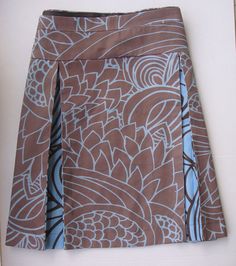 a brown and blue skirt with flowers on it