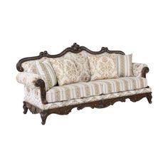 an old fashioned couch with pillows on the arm and back, sitting against a white background