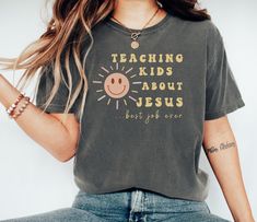 Inspire faith in our "Teaching Kids about Jesus" shirt - a must-have for ministry leaders, ministers, and youth pastors. Elevate your impact in children's ministry with this Christian tee, a blend of comfort and purpose. Make a statement of devotion with our Church Shirt, designed to spark conversations and share the joy of spreading the teachings of Jesus. Embrace the calling with style and comfort - an ideal addition to your ministry wardrobe. Comfort Colors introduces the "Comfort Colors 1717 Youth Pastor, Church Shirt, About Jesus, Jesus Shirt, Christian Tees, Christian Shirt, Children's Ministry, Jesus Shirts, Christian Shirts