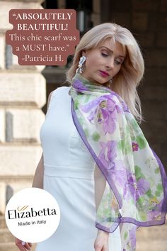 Elevate your wardrobe with an Italian-made lavender floral silk scarf by Elizabetta. This long silk scarf, handcrafted in Italy, will transform any outfit into a work of art. Perfect for those who appreciate the finer things in life, you won't want to miss out on this luxurious accessory. Elegant Floral Print Silk Scarf For Gift, Elegant Floral Print Silk Scarf Gift, Summer Purple Silk Scarf As A Gift, Summer Purple Silk Scarf, Purple Silk Scarves For Spring, Purple Silk Scarf For Summer Gift, Elegant Floral Print Scarves For Summer, Summer Gift Purple Silk Scarf, Purple Scarves For Wedding