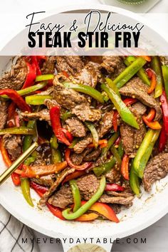 steak stir fry with peppers in a white bowl