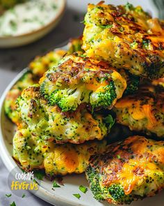 broccoli covered in cheese on a plate