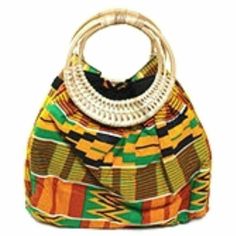 African Traditional Kente Print Wicker Handle Tote Handbag Color: Multi Material: 100% Cotton Handle Measurements: Length: 7 1/2'' Tote Measurements: Length: 14'' x Width: 6'' x Height: 12 1/2'' Coin Purse Measurements: Length: 5 3/8'' x Width: 4 1/2'' Be bold and vibrant with this Traditional Kente print tote handbag. This tote features a wicker handle, attached inner coin purse & Velcro closures on each side. Tote handbags may vary, as the pattern layout on each bag will be different. Ghana Fashion, Kente Print, African Bag, African Accessories, Walking Down The Street, African Fashion Designers, Kente Styles, Kente Cloth, Printed Purse