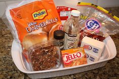 an assortment of food in a container on a counter