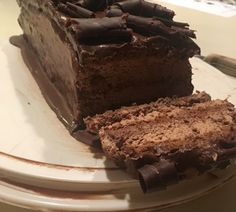 two slices of chocolate cake on a plate