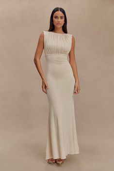 Understated glamour. The MALIA Slinky Ruched Maxi Dress is a masterclass in elegant design. Featuring a sophisticated boat neckline and daring open back, this bodycon dress flatters your silhouette with gathering detail at the bust. The fishtail hem adds a touch of drama, creating a graceful flow with every step. Fully lined for a smooth finish, Malia is the epitome of refined style. Bridal Shower Attire, Rehearsal Dinner Outfits, Understated Glamour, Wedding After Party, European Summer Outfits, Ruched Maxi Dress, Maxi Dress Sale, Capsule Outfits, Refined Style