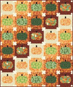 an orange and green patchwork quilt