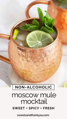 two copper mugs filled with moscow mule cocktail