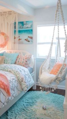 a bedroom with a hammock chair and bed