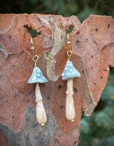 Air dry clay mushroom earrings that dangle from a 14k gold plated hook.  Includes a box for gift giving.  Not recommended for in-water wear. Not returnable for health safety reasons. Clay Mushroom Earrings, Mushroom Clay, Clay Mushroom, Box For Gift, Mushroom Earrings, Clay Inspiration, Dry Clay, Air Dry Clay, Gift Giving