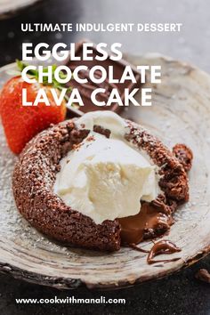 an eggless chocolate lava cake with ice cream on top and strawberries in the background