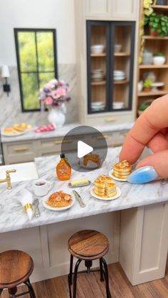 Kristine Hanna - Miniatures on Instagram: "🥞 Mini Breakfast! 🧇 We’ve got banana pancakes and French toast on the menu this morning. How cute is this French Press @theminibeachhouse sent me as an engagement gift last year?? She also made the Eggs Benny.  I love the way the glass looks on the French press and Eggs Benny is my husband’s favourite. ☕️ 
.
 What breakfast item should I hunt for next?  I do have some fried eggs.🍳 
.
 My mini artist sources: 🥞 Pancake set, French toast set, dirty dishes @cuteinminiature
☕️ French Press and Eggs Benny @theminibeachhouse
🧼 Vanilla, Dish soap, Oven Mitt, Maple Syrup @Lugartpetit ☕️ Keurig @minifanaberia
🫒 Pantry food @a_novel_mini 
🪑 Working Spinning Stools @fatih_karalar_
🌸 Flowers @marthamcleanminiatures and @miniaturegardenflorals
.
Remind Eggs Benny, Mini Breakfast, Pantry Food, Fried Eggs, Dirty Dishes, Banana Pancakes, Breakfast Items, On The Menu, Oven Mitt