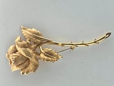 CHAREL vintage beautiful large goldplated rose brooch.  Measures 1 1/2 x 3 5/8 inches. Excellent condition. Substantial.  Signed CHAREL on the back. Nice statement piece. Formal Gold Brooch With Rose Design, Rose Brooch, Vintage Fans, Flower Vintage, Vintage Flowers, Statement Pieces, Etsy Vintage, Brooch Pin, Brooches